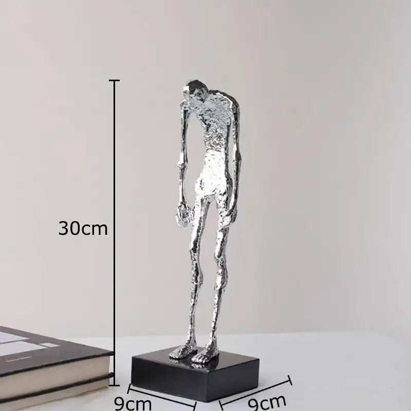 Silver textured slender humanoid abstract couple statue on black base for decorbites abstract desk decoration