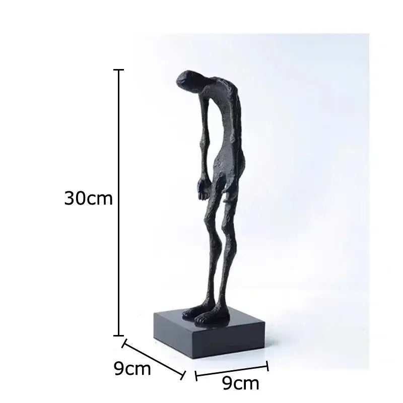 Black matte-finished abstract couple statue by decorbites on square base for desk decoration and room aesthetics