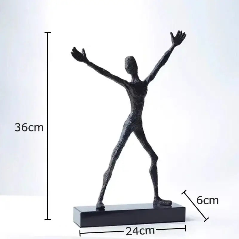 Black abstract human figure sculpture with outstretched arms on rectangular base in decorbites abstract couple statue for decor