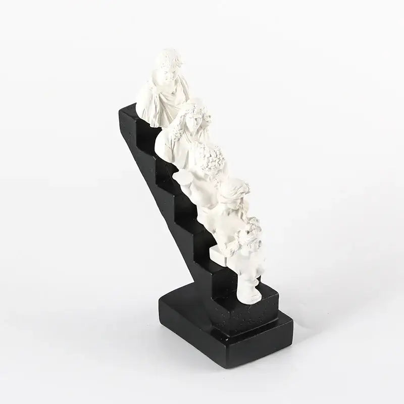 White resin decorbites abstract david statue sculpture featuring classical busts on a sleek black staircase base for home decor