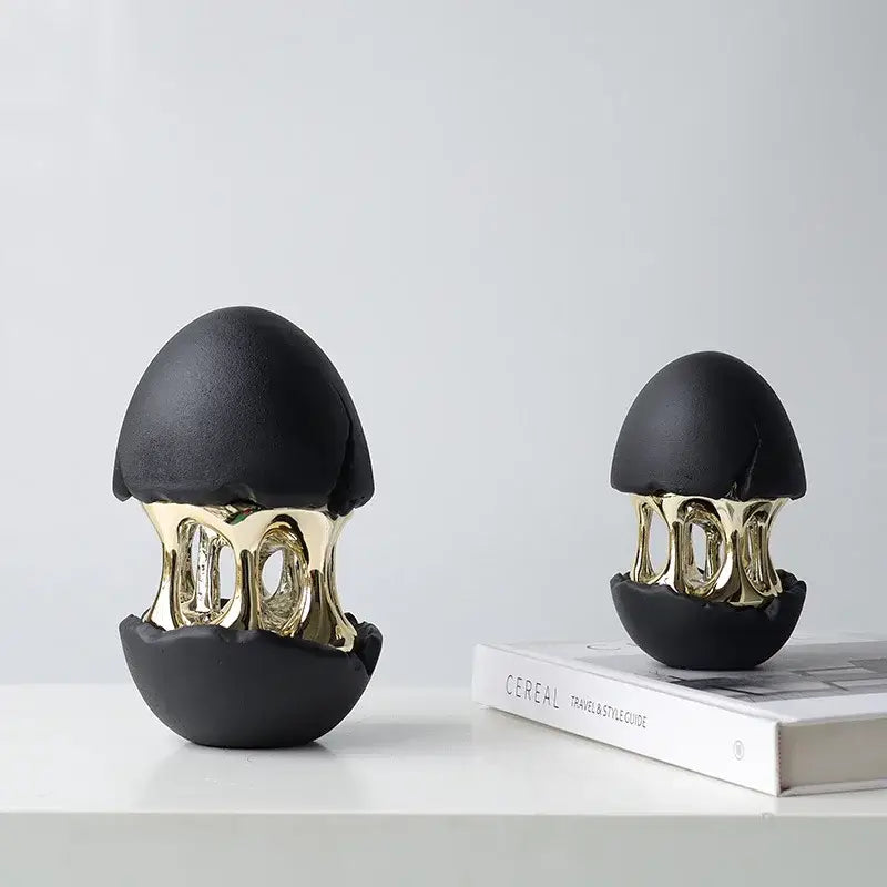 Black and gold ceramic decorative figurine with cracked shell design from DecorBites abstract eggshell hollow series