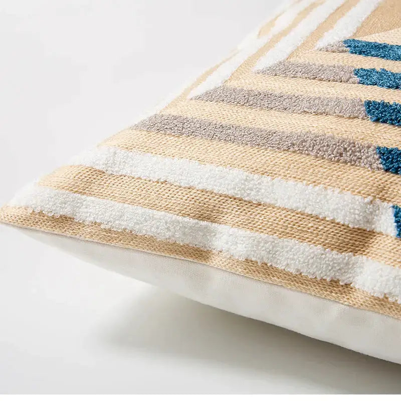 Beige and white striped decorbites abstract embroidered pillow cover with blue and gray woven fabric accents for living room