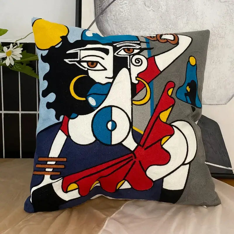 A decorbites abstract embroidery pillowcase featuring a vibrant stylized portrait with bold colors and geometric shapes
