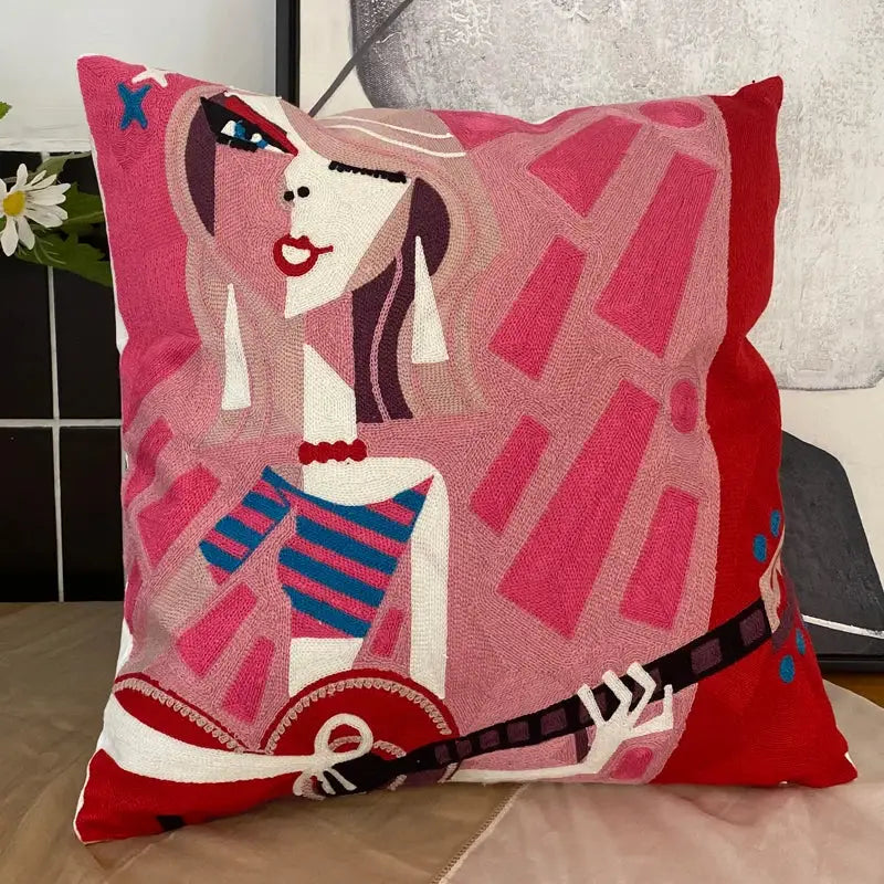 DecorBites abstract embroidery pillowcase 45x45cm vibrant pink and red with stylized woman holding guitar design