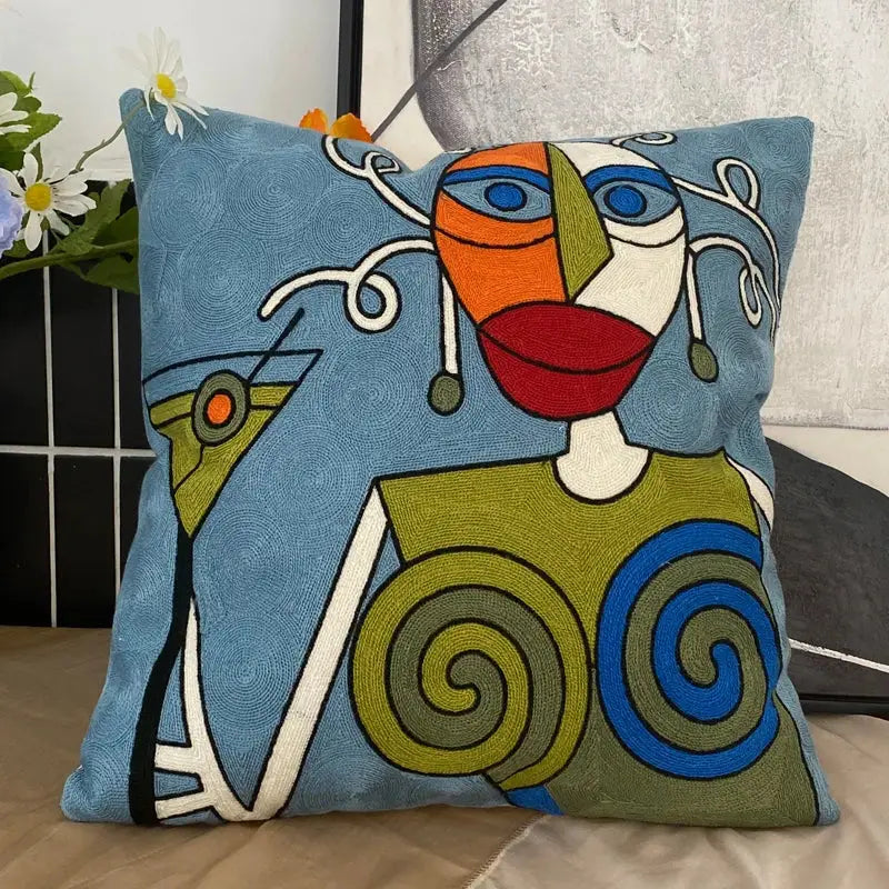 Blue cushion with vibrant abstract embroidery face in orange green and red decorbites abstract embroidery pillowcase