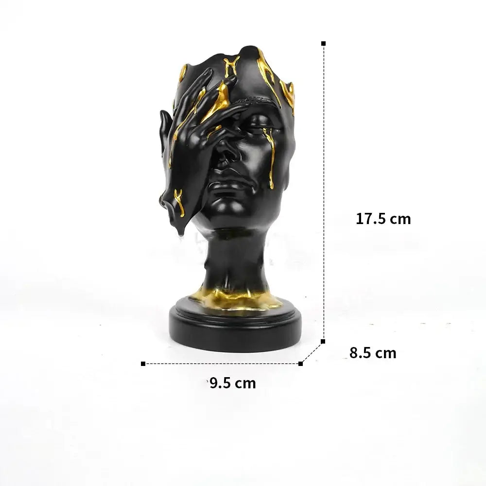 DecorBites abstract face mask black and gold resin sculpture with hand covering one eye for home decor display