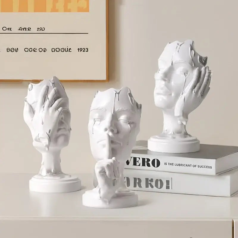 Three white ceramic decorbites abstract face mask silence gold resin home decor figurines showing expressive gestures