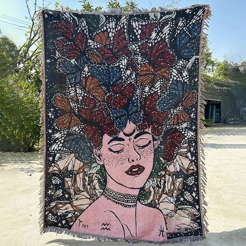 Woven decorbites abstract face throw blanket featuring a colorful butterfly crown on a dark background 130x180cm