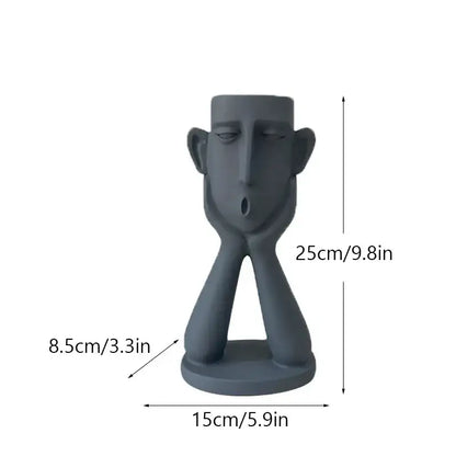 Matte gray ceramic decorbites abstract family flowerpot ornament shaped like a stylized human head with hands supporting face