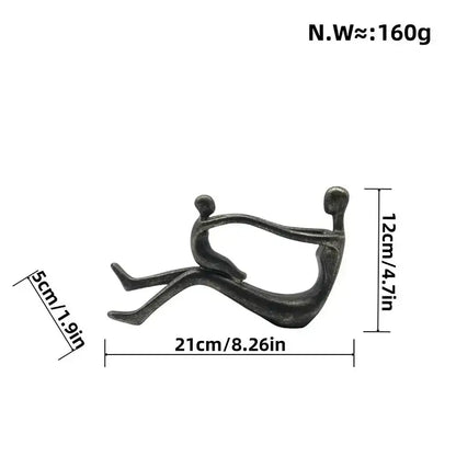 Bronze-colored decorbites abstract family resin sculpture of two intertwined figures for desk decor and room aesthetic