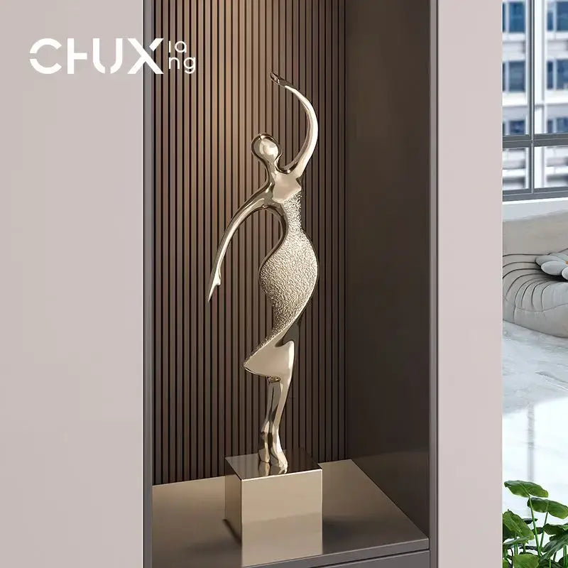 Decorbites abstract figure gold-toned metallic figure art sculpture with flowing pose for luxury living room decor