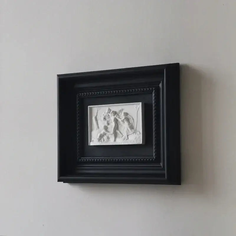Black framed white decorbites abstract figure relief sculpture decorative painting showing figures in motion