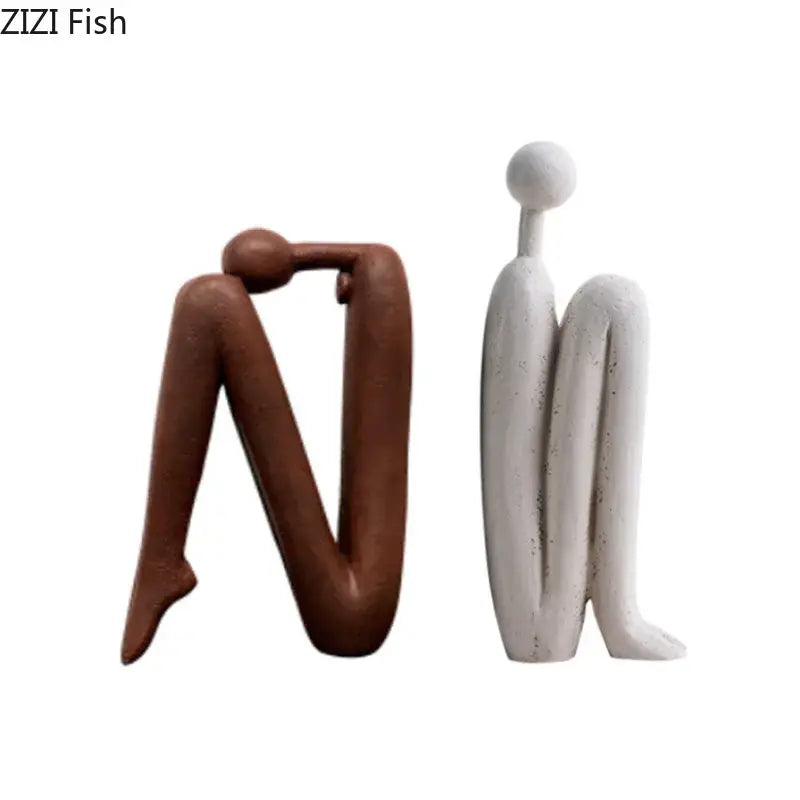 Decorbites abstract figure resin sculpture desk decor featuring two minimalist seated human forms in brown and white
