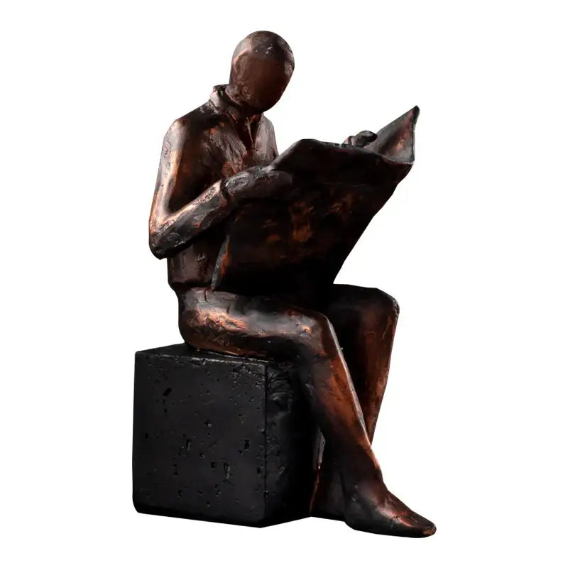 Bronze decorbites abstract figure resin sculpture of seated man reading newspaper on black pedestal bookend
