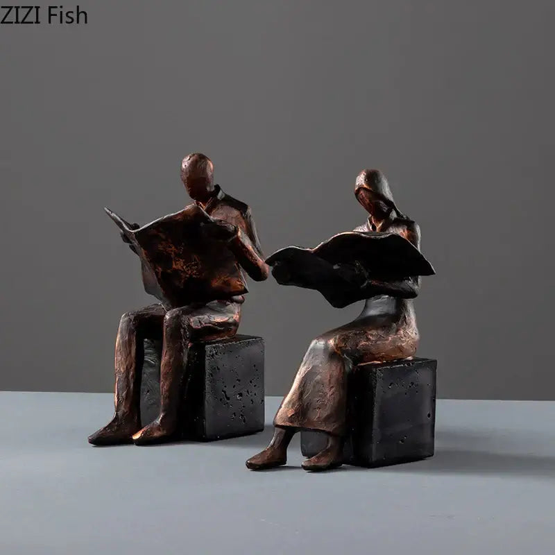 Bronze decorbites abstract figure sculpture bookend resin statue of man and woman reading on black stone blocks desk decor