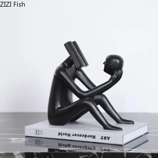 Black glossy resin decorbites abstract figure sculpture of seated figure with book head and book to face for room decor