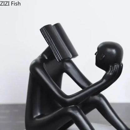 Black glossy resin decorbites abstract figure sculpture featuring two human-like figures for creative room decor