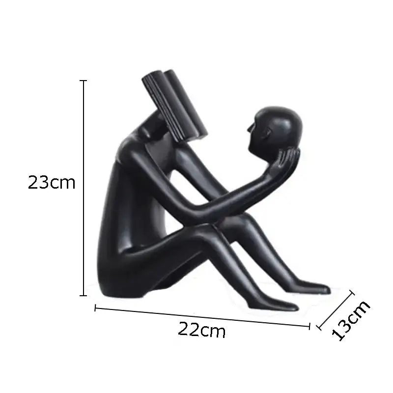 Black glossy resin decorbites abstract figure sculpture of two intimate human forms one with a book head for room decor
