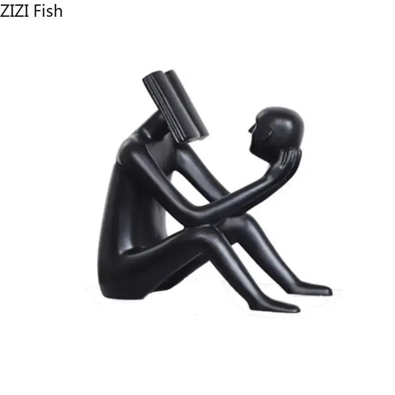 Black glossy resin decorbites abstract figure sculpture of two intimate human forms with book-like object for room decor