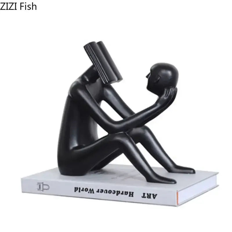 Black glossy resin decorbites abstract figure sculpture of two figures with book and resting head for room decor