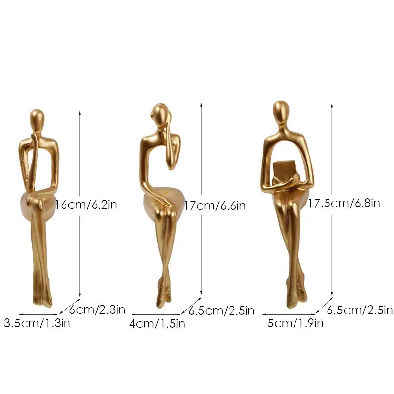 Three gold-colored decorbites abstract figurines set featuring smooth glossy modern art sculptures for home and office