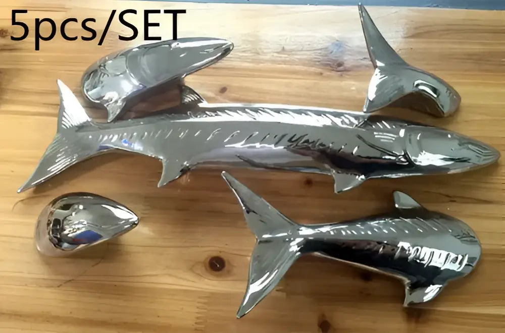 Set of five shiny chrome-finished fish-shaped chrome emblems for decorbites abstract fish ceramic wall decoration set