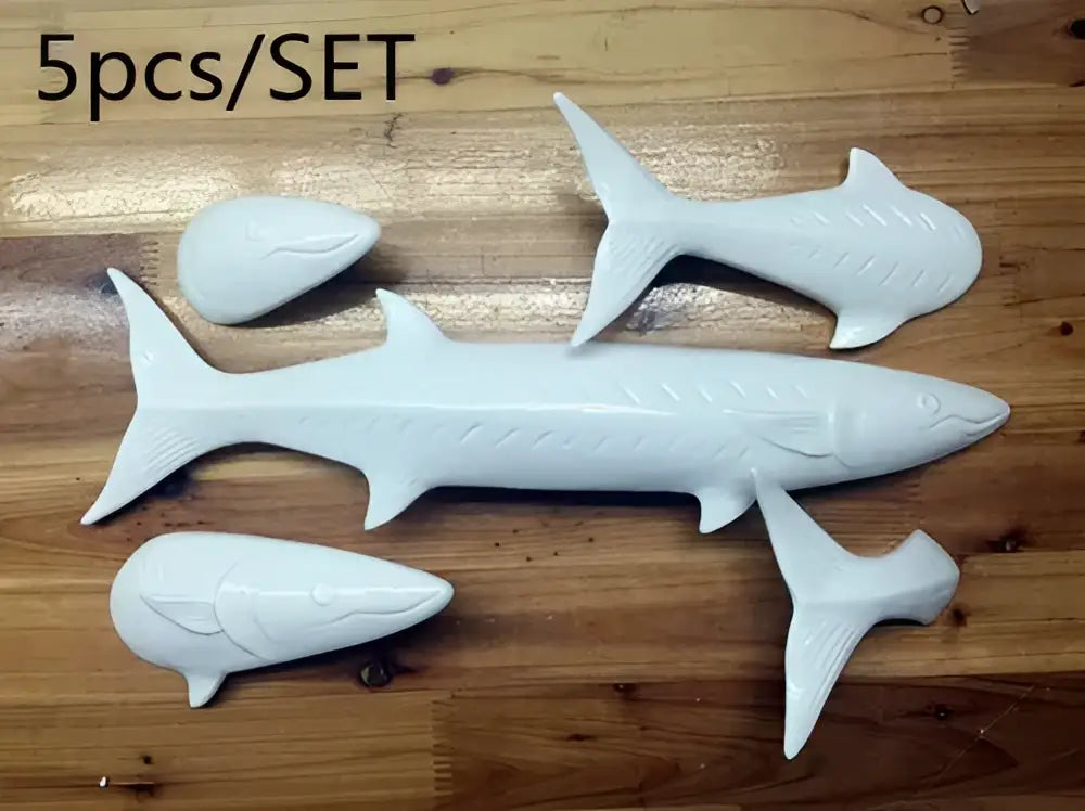 Decorbites abstract fish ceramic wall decoration set featuring white ceramic barracuda and smaller fish for children’s room