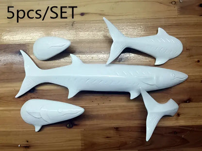 Decorbites abstract fish ceramic wall decoration set featuring white ceramic barracuda and smaller fish for children’s room