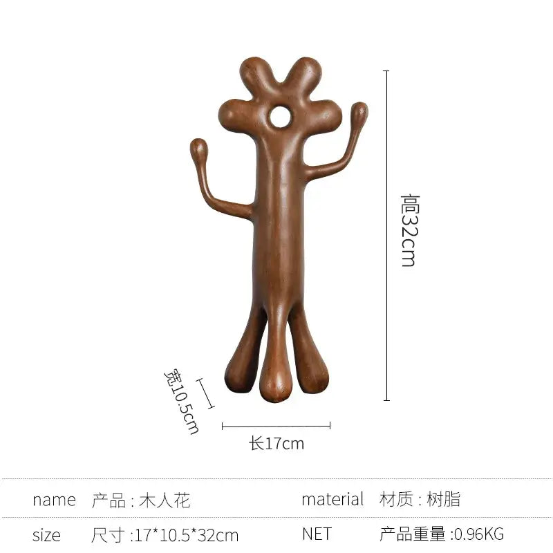 Brown resin decorbites abstract flower man sculpture with circular head and elongated limbs for home decor