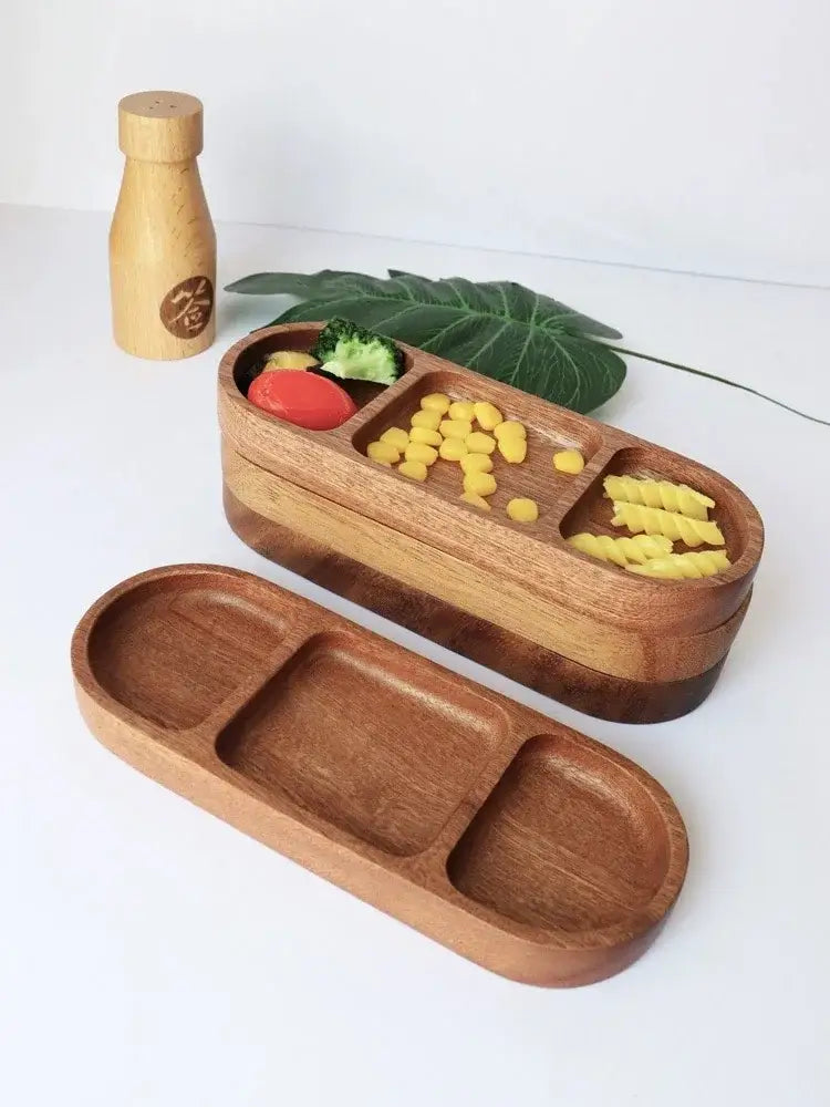 Wooden acacia wood oval dip plate with three smooth compartments in natural wood finish for serving dips