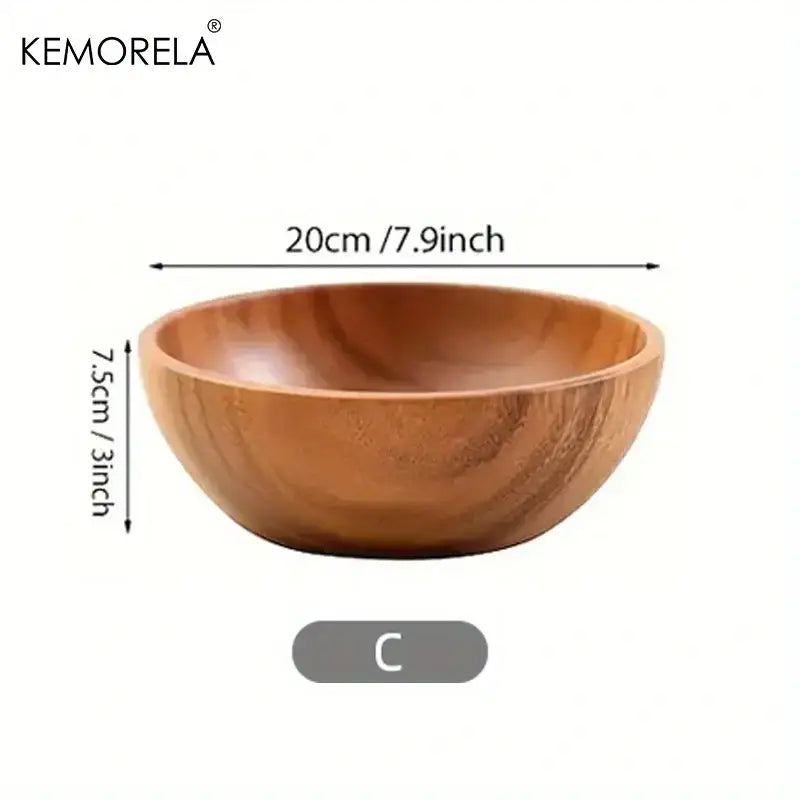 A smooth light brown acacia wooden salad bowl with natural wood grain and rounded edges ideal for fruit and vegetables