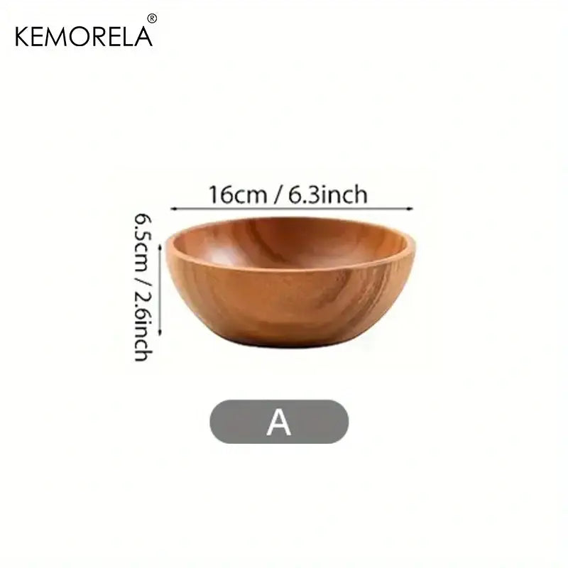 A smooth light brown acacia wooden salad bowl with natural grain and rounded edges for fruit and vegetables
