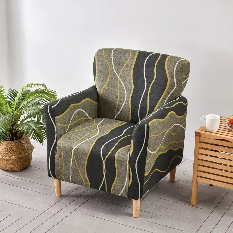 A decorbites™ accent chair cover slipcover featuring bold black olive green and gold wavy stripes in stretchy fabric