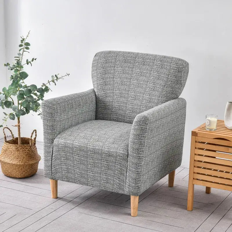Gray plaid fabric accent chair with wooden legs featuring a DecorBites accent chair cover slipcover stretch design