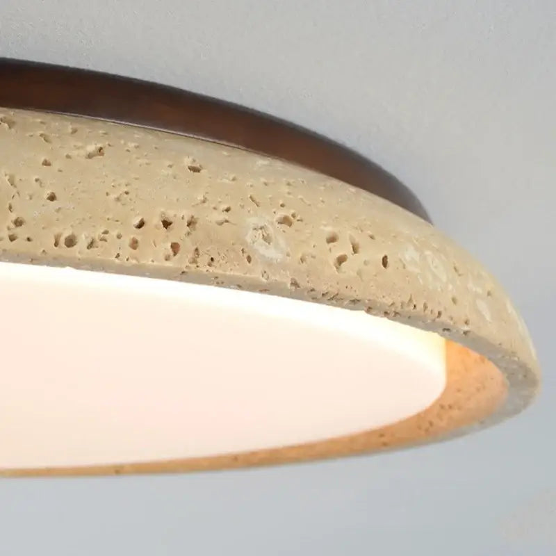 Decorbites™ acryl travertine led ceiling light with textured beige concrete ring and warm glowing white diffuser