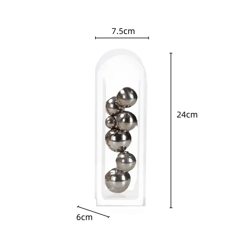 A clear acrylic ball vase stack featuring seven polished metallic spheres in a decorbites acrylic ball vase accessory