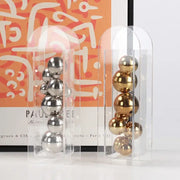 Clear acrylic ball vase stack with polished silver and gold metallic spheres for home decoration and floral display