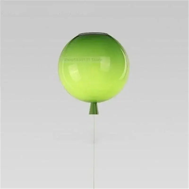 Translucent lime green acrylic balloon ceiling light with darkened top and small stem for modern nordic decor