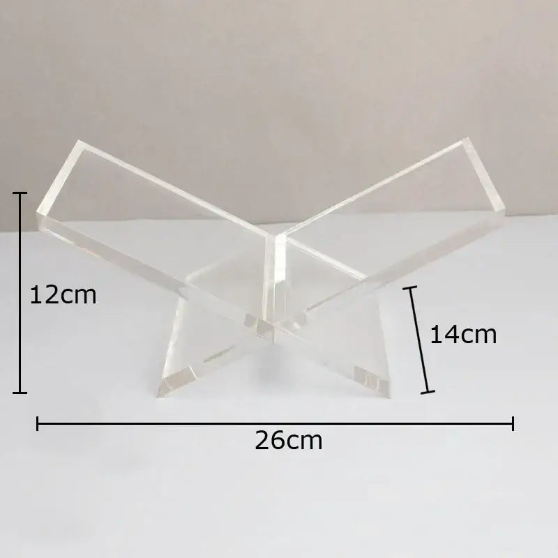 Clear acrylic butterfly-shaped bookshelf with marble base for modern home decor and organized storage