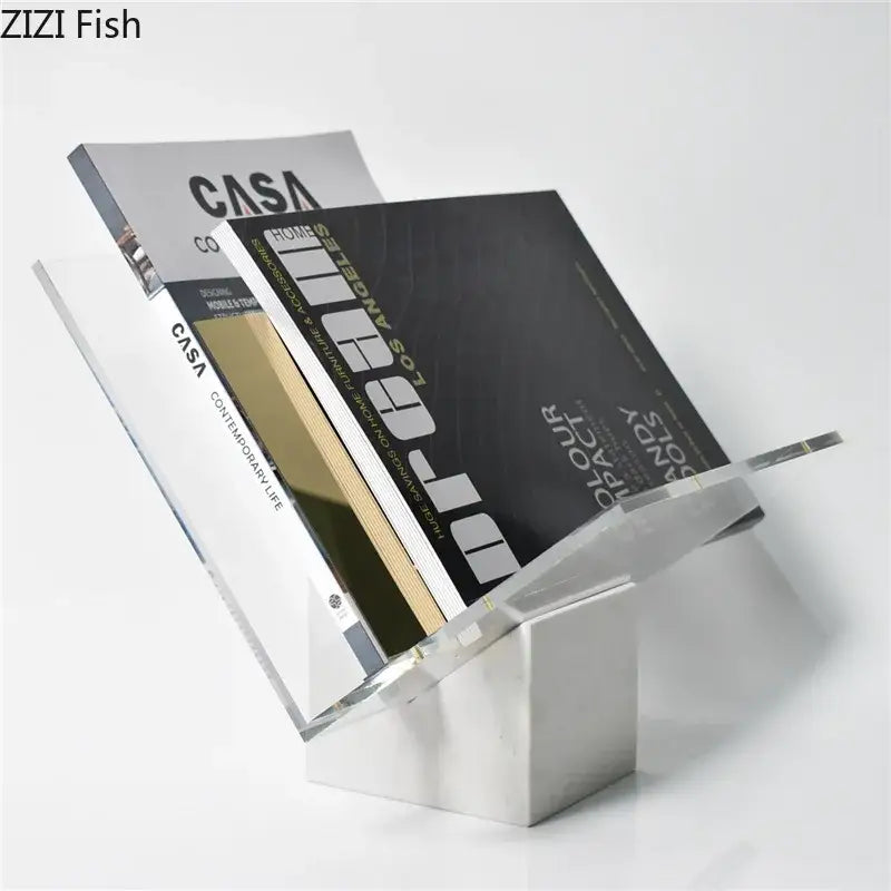 Clear acrylic bookshelf with marble base and solid white base for modern home decor and magazine organization