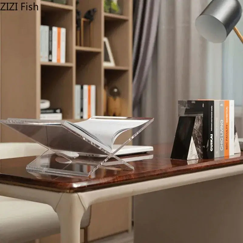 Clear acrylic bookshelf with a marble base from DecorBites™ ideal for modern home decor and magazine organization