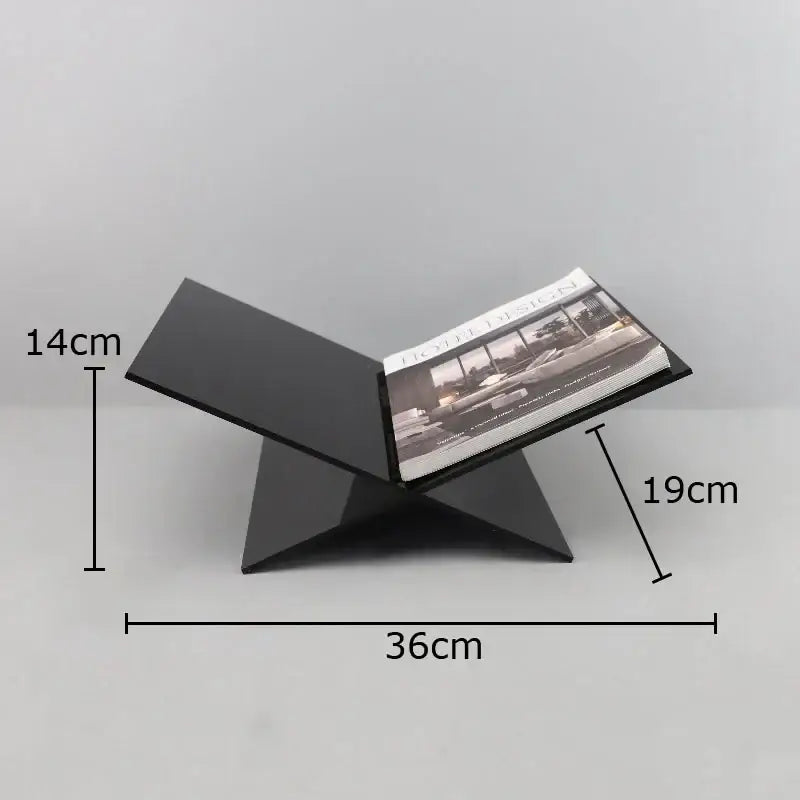 Black acrylic bookshelf with marble base featuring a geometric modern design for stylish home decor and magazine storage