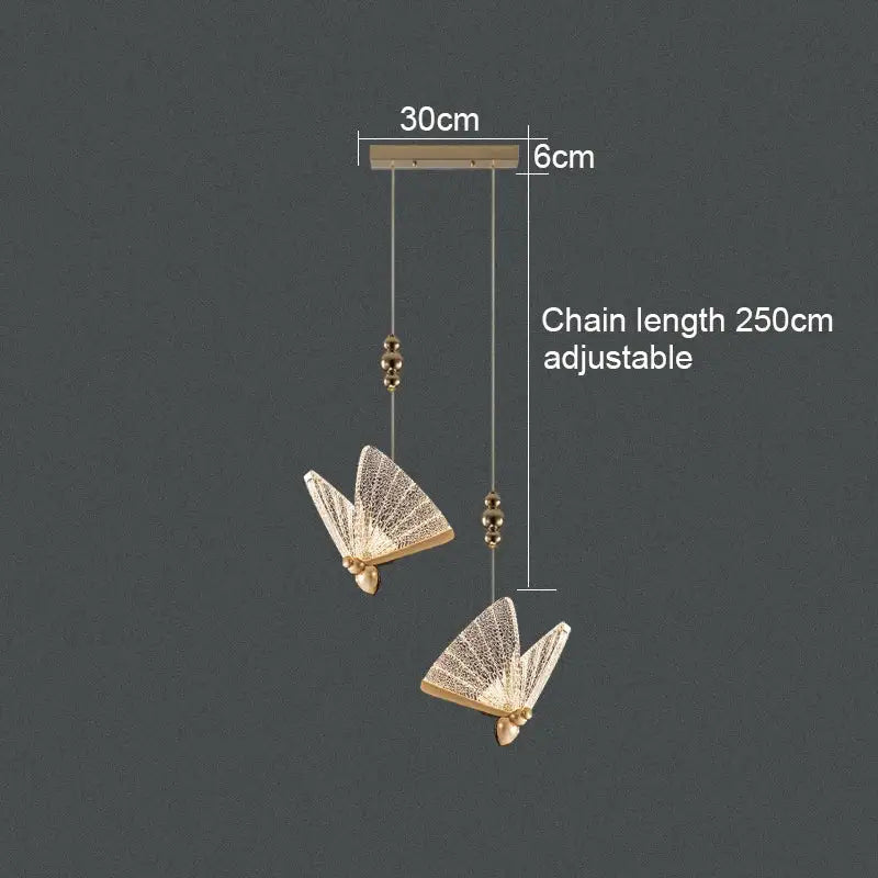 Gold-toned acrylic butterfly chandelier ceiling lamp with intricate mesh wings and adjustable chains for indoor lighting