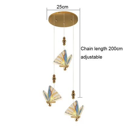 Gold-toned acrylic butterfly chandelier ceiling lamp with iridescent wings and adjustable chain for indoor lighting