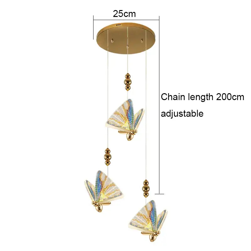 Gold-toned acrylic butterfly chandelier ceiling lamp with iridescent wings and adjustable chain for indoor lighting