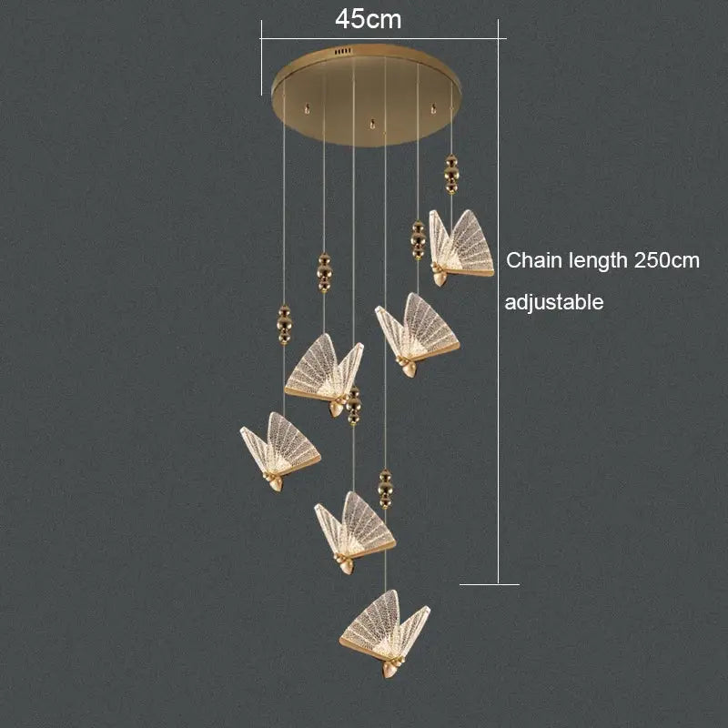 Gold-toned decorbites™ acrylic butterfly chandelier ceiling lamp with translucent patterned wings and adjustable chain