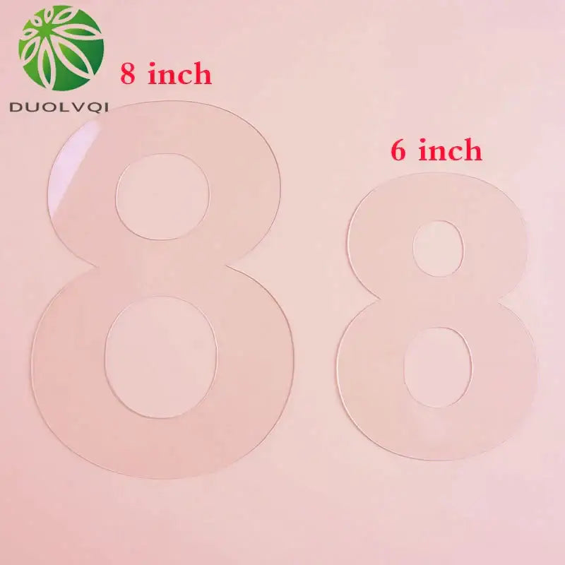 Clear acrylic number cutouts in 8-inch and 6-inch sizes from the DecorBites™ acrylic cake decorating stencil set for cake decorating