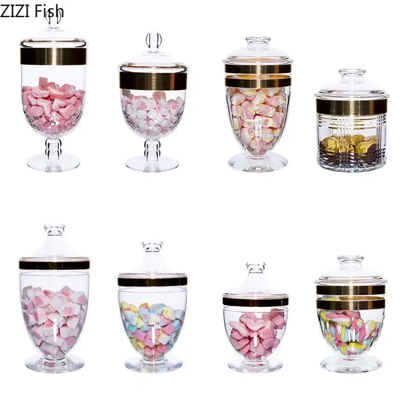 Decorbites acrylic candy and spice jar set with clear glass jars, gold-rimmed lids, and colorful marshmallows inside