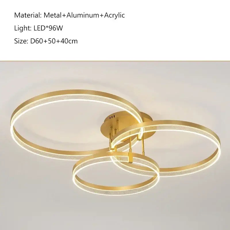 Modern gold-toned decorbites acrylic ceiling chandelier with three interlocking metal, aluminum, and acrylic rings