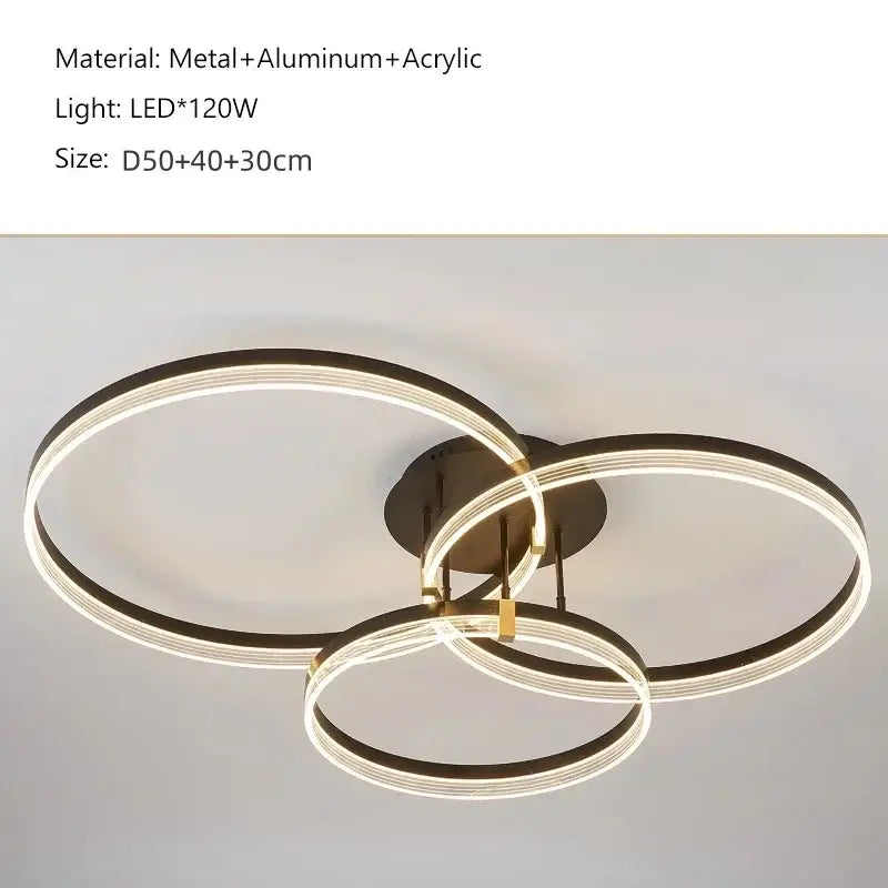 DecorBites™ acrylic ceiling chandelier with three interlocking black rings featuring glowing LED illumination